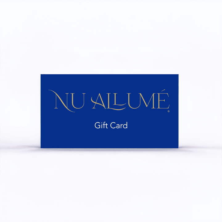Nu Allumé gift card with gold text on a blue background
