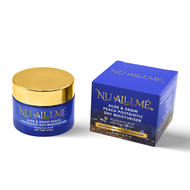 Blue jar and box of NuAllume moisturizer on a white background
